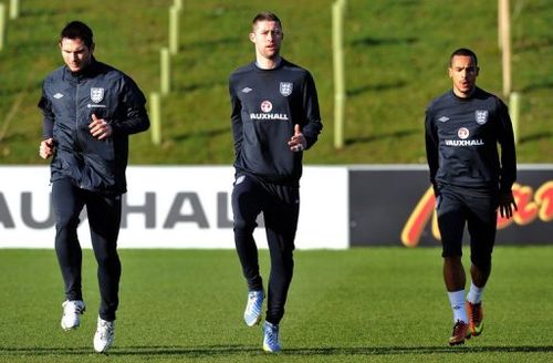 (From L) England's Frank Lampard, Gary Cahill and Theo Walcott, pictured during a training session, on February 4, 2013