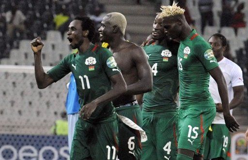 Burkina Faso players celebrate after their quarter-final win against Togo in Nelspruit on February 3, 2013