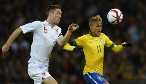 England's defender Gary Cahill (L) challenges Brazil's striker Neymar (R) on February 6, 2013