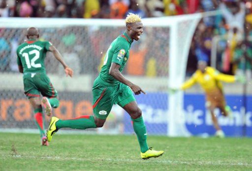 Burkina Faso&#039;s forward Aristide Bance (C) celebrates at the end of a penalty shoot out on February 6, 2013