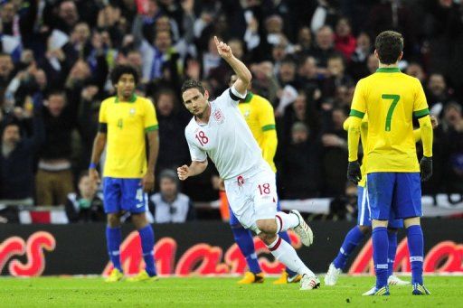 Frank Lampard celebrates scoring England&#039;s second goal -- the winner -- in the friendly against Brazil on February 6, 2013