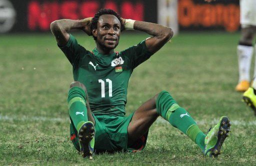 Burkina Faso&#039;s Jonathan Pitroipa reacts after receiving a red card against Ghana in Nelspruit on February 6, 2013