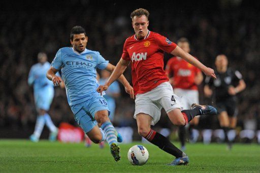 Manchester United&#039;s English defender Phil Jones (R) at The Etihad Stadium in Manchester on April 30, 2012