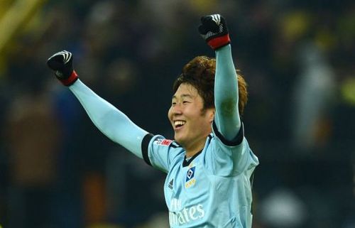 Hamburg's Korean striker Son Heung-Min celebrates in Dortmund on February 9, 2013