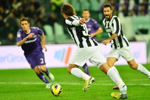 Juventus&#039; forward Alessandro Matri (C) looses his shoe before scoring in Turin on February 9, 2013