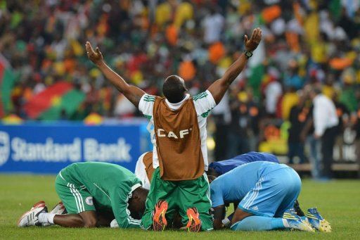 Nigeria&#039;s players celebrate after winning the 2013 African Cup of Nations on February 10, 2013 at Soccer City stadium