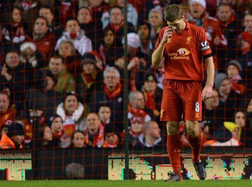 Liverpool midfielder Steven Gerrard reacts after West Brom&#039;s second goal at Anfield on February 11, 2013