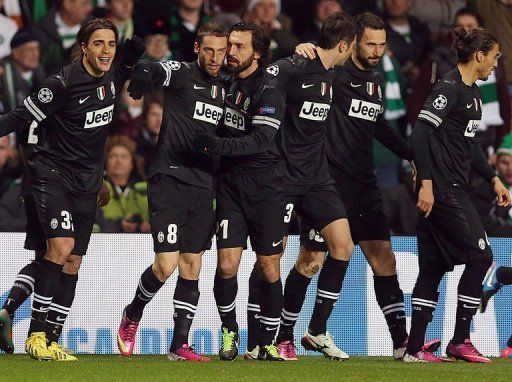 Juve&#039;s Alessandro Matri (L), Claudio Marchisio (2nd L) and Andrea Pirlo (C) in Glasgow on February 12, 2013