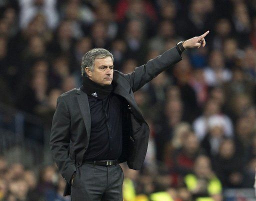 Real Madrid coach Jose Mourinho gestures in Madrid on February 13, 2013
