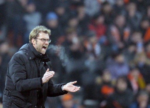 Borussia Dortmund coach Jurgen Klopp reacts in Donetsk on February 13, 2013