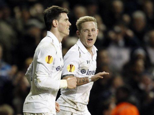 Tottenham Hotspur&#039;s Gareth Bale (L) celebrates scoring at White Hart Lane in London, England, on February 14, 2013