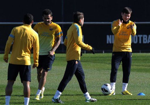Barcelona players take part in a training session in Sant Joan d&#039;Espi, near Barcelona on February 13, 2013