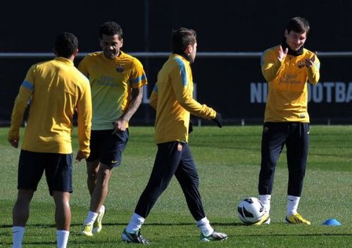 Barcelona players take part in a training session in Sant Joan d'Espi, near Barcelona on February 13, 2013