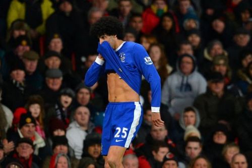 Everton's Marouane Fellaini reacts during the match against Manchester United at Old Trafford on February 10, 2013