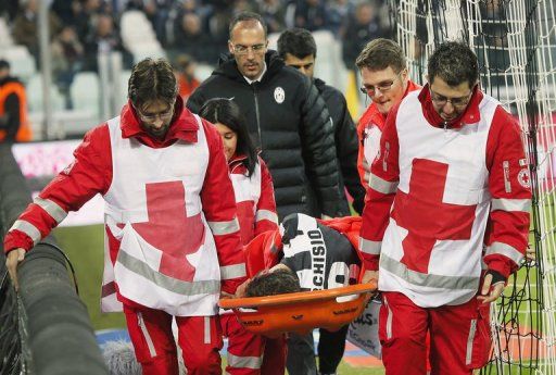 Juventus&#039; Claudio Marchisio is carried off the playing field by medical staff, in Turin, on January 6, 2013