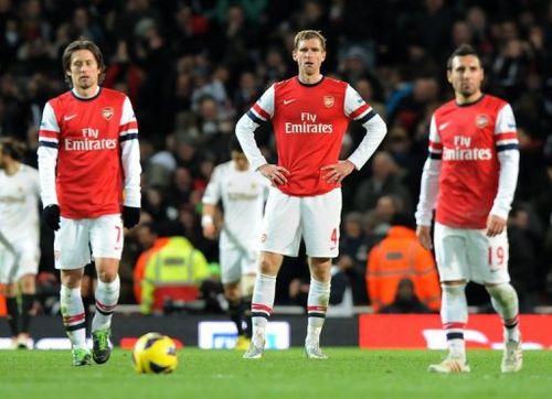 Mertesacker reacts during an English Premier League football match on December 1, 2012