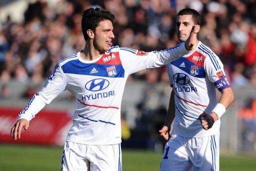 Clement Grenier (L) celebrates after scoring a goal against Bordeaux on February 17, 2013