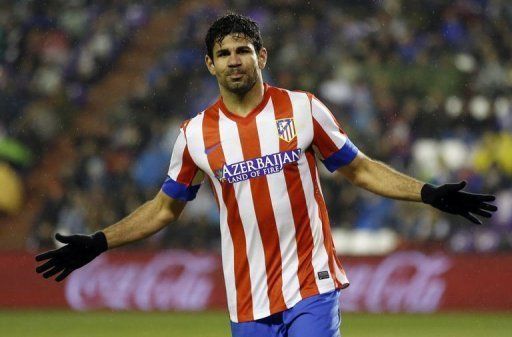 Atletico Madrid&#039;s Diego Costa celebrates after scoring in Valladolid on February 17, 2012
