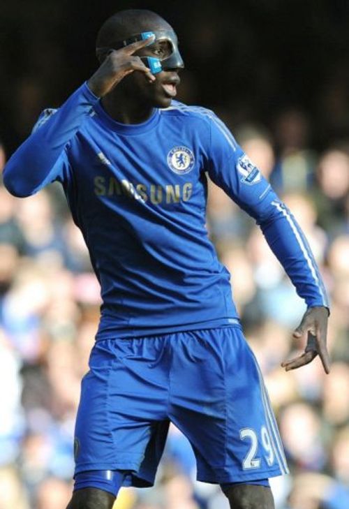 Chelsea's Demba Ba wears a protective face mask in London on February 17, 2013