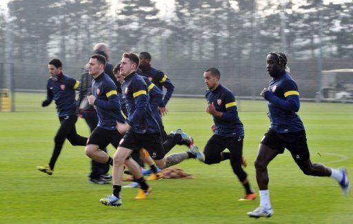 Arsenal go through their paces on February 18, 2013, on the eve of their UEFA Champions League clash with Bayern Munich