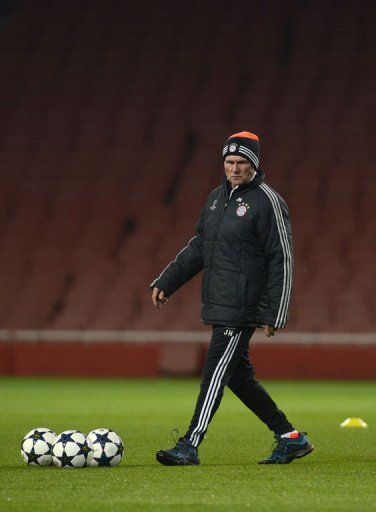 Bayern Munich manager Jupp Heynckes prepares for a training session at the Emirates Stadium on February 18, 2013