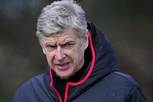 Arsene Wenger takes training on February 18, 2013, the eve of the UEFA Champions League game against Bayern Munich