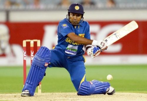 Sri Lanka batsman Mahela Jayawardene hits a reverse sweep against Australia on January 28, 2013