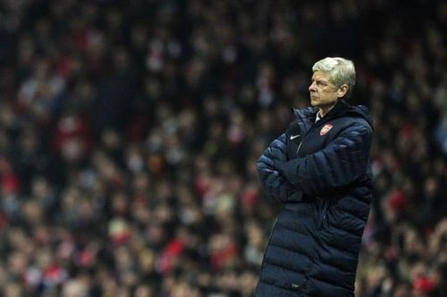 Arsene Wenger watches the action from the touchline during the clash with Bayern Munich on February 19, 2013