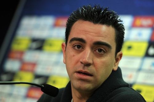 Barcelona midfielder Xavi Hernandez gives a press conference on February 21, 2013