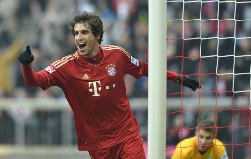 Bayern Munich&#039;s midfielder Javi Martinez celebrates a goal in Munich on February 23, 2013
