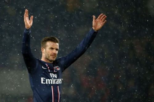 Paris Saint-Germain's David Beckham waves on February 24, 2013 at the Parc des Princes stadium in Paris