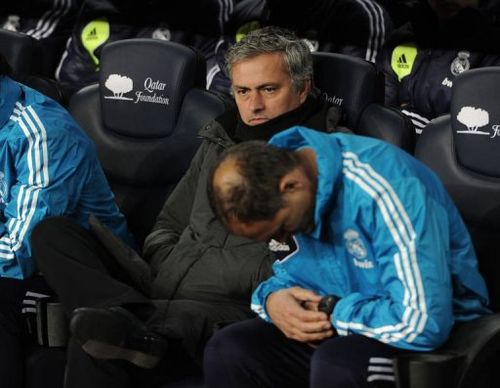 Real Madrid's coach Jose Mourinho (C) is pictured before the match in Barcelona on February 26, 2013