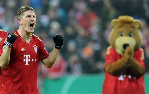 Bayern Munich's Bastian Schweinsteiger celebrates after the match in Munich, southern Germany, on February 27, 2013