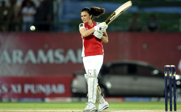 Miss Zinta batting with wicket-keeping pads on. Says it all really.