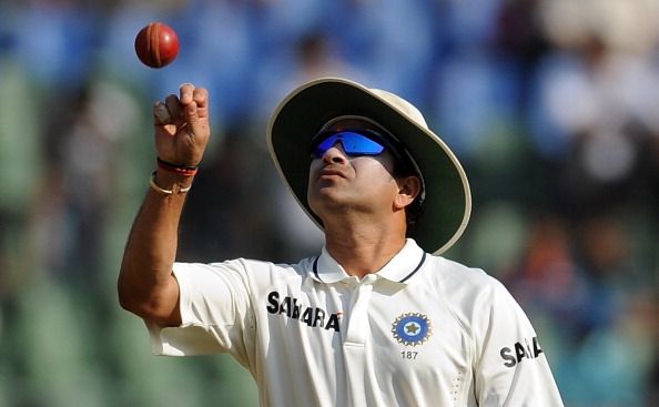 Indian cricketer Sachin Tendulkar tosses