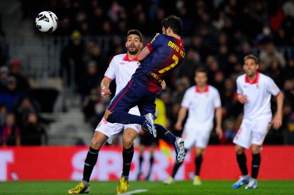 David Villa of FC Barcelona scores his team&#039;s first goal during the La Liga match between FC Barcelona and Sevilla 