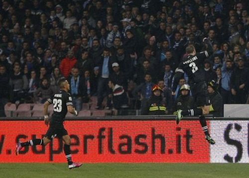 Juventus' defender Giorgio Chiellini (R) celebrates after scoring at San Paolo Stadium in Naples on March 1, 2013