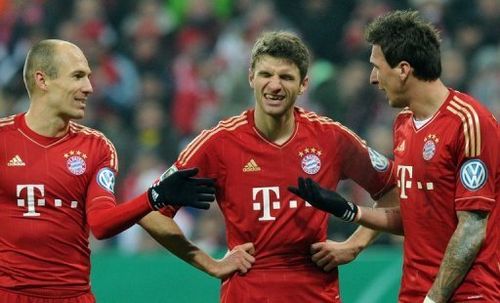 Bayern Munich's Arjen Robben, Thomas Mueller and Mario Mandzukic are pictured in Munich on February 27, 2013