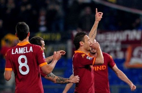 AS Roma's Francesco Totti celebrates after scoring on March 3, 2013 in Rome