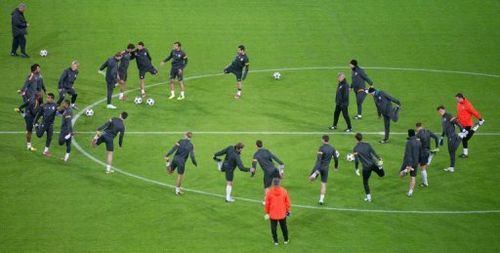 Donetsk's players warm up during a training session in Dortmund, on March 4, 2013