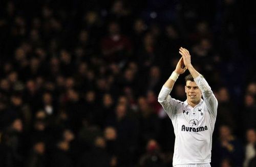 Tottenham Hotspur's Gareth Bale thanks the fans at White Hart Lane in north London on March 3, 2013