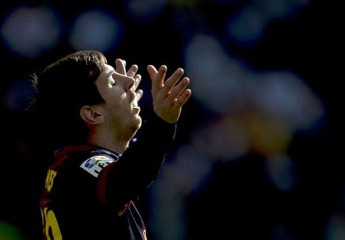 Barcelona's Lionel Messi reacts at the Santiago Bernabeu stadium in Madrid on March 2, 2013