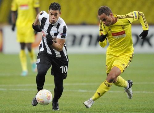 Newcastle's Hatem Ben Arfa (L) vies with Anji's Ewerton at Stadion Luzhniki in Moscow on March 7, 2013