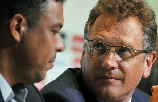 Jerome Valcke (R) and Ronaldo Nazario attend a press conference in Rio de Janeiro, Brazil, on March 7, 2013