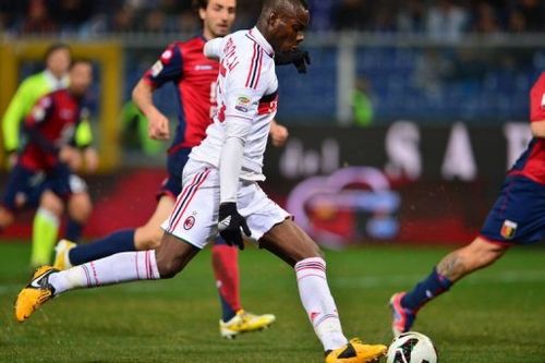 AC Milan's forward Mario Balotelli kicks to scores at the Marazzi Stadium in Genoa on March 8, 2013