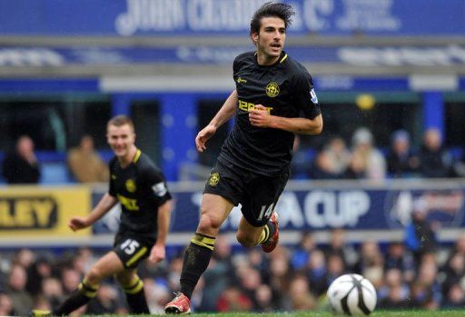 Jordi Gomez celebrates scoring his team&#039;s third goal in Liverpool on March 9, 2013