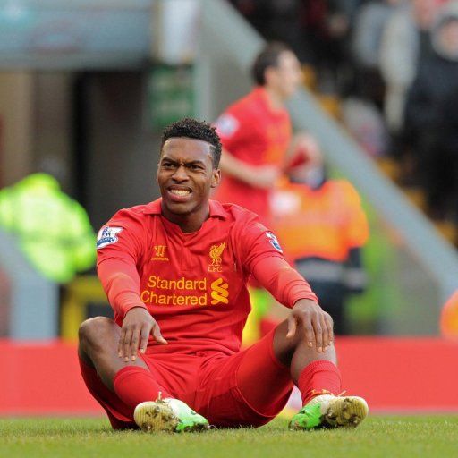 Liverpool striker Daniel Sturridge reacts after missing a chance against Swansea City on February 17, 2013