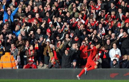 Liverpool's Luis Suarez celebrates scoring in Liverpool on March 10, 2013