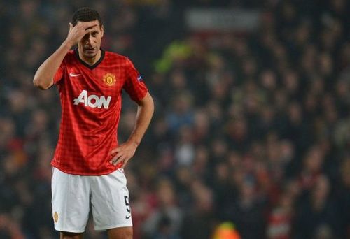 Manchester United's English defender Rio Ferdinand reacts at Old Trafford in Manchester, on March 5, 2013