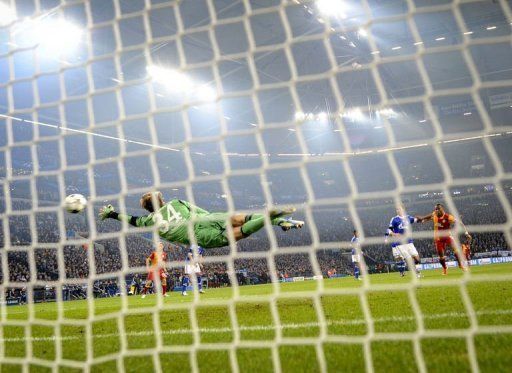 Schalke keeper Timo Hildebrand is beaten during the UEFA Champions League match against Galatasaray on March 12, 2013